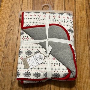 Honest Baby Clothing. You will get this nice reversible baby blanket.